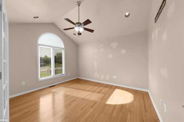 45259 Yorkshire Dr, Macomb, MI 48044 - unfurnished room featuring a ceiling fan, light wood finished floors, vaulted ceiling, and baseboards