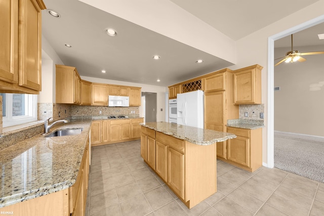 45259 Yorkshire Dr, Macomb, MI 48044 - kitchen with a sink, white appliances, a ceiling fan, tasteful backsplash, and light tile patterned floors