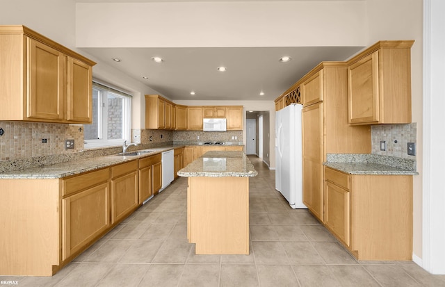 45259 Yorkshire Dr, Macomb, MI 48044 - kitchen featuring white appliances, a sink, tasteful backsplash, recessed lighting, and light stone counters