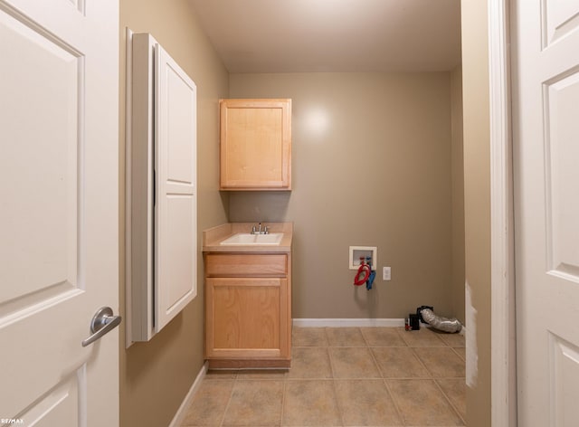 45259 Yorkshire Dr, Macomb, MI 48044 - washroom featuring light tile patterned flooring, hookup for a washing machine, cabinet space, and baseboards