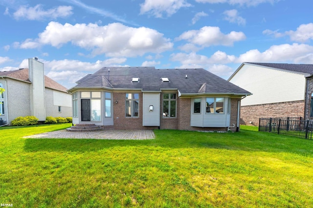 45259 Yorkshire Dr, Macomb, MI 48044 - back of house featuring brick siding and a patio area