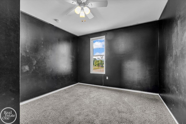 1401 Stanton St, Port Huron, MI 48060 - empty room featuring carpet floors, a ceiling fan, and a smoke detector