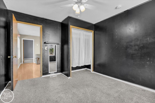 1401 Stanton St, Port Huron, MI 48060 - unfurnished bedroom featuring carpet, a closet, and ceiling fan