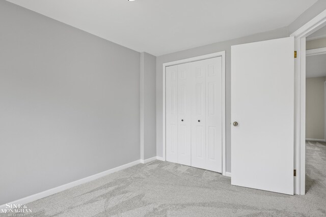 22920 Marter Rd, Saint Clair Shores, MI 48080 - unfurnished bedroom with carpet, a closet, and baseboards