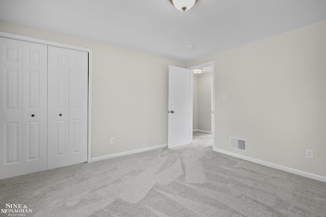 22920 Marter Rd, Saint Clair Shores, MI 48080 - unfurnished bedroom featuring carpet floors, baseboards, and a closet