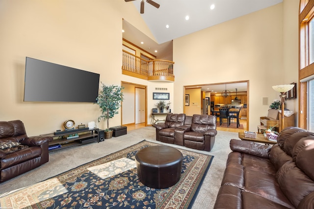 55733 Whitney Ct, Shelby Twp, MI 48315 - carpeted living area featuring high vaulted ceiling, ceiling fan, and recessed lighting