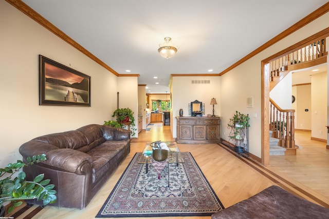 55733 Whitney Ct, Shelby Twp, MI 48315 - living room featuring light wood-type flooring, stairs, crown molding, and recessed lighting
