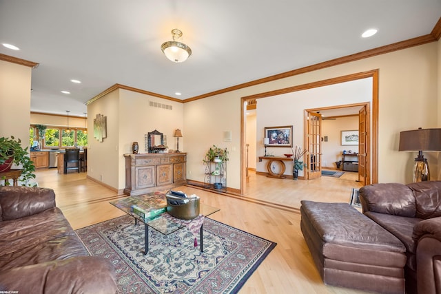 55733 Whitney Ct, Shelby Twp, MI 48315 - living room with wood finished floors, crown molding, and recessed lighting
