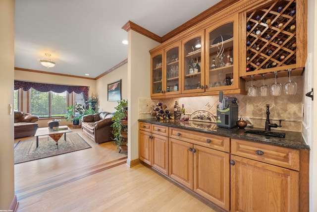 55733 Whitney Ct, Shelby Twp, MI 48315 - indoor dry bar with crown molding, light wood finished floors, backsplash, and recessed lighting