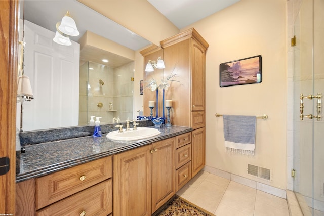 55733 Whitney Ct, Shelby Twp, MI 48315 - full bath with a shower stall, vanity, and tile patterned floors