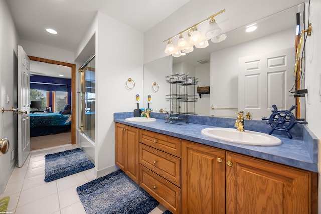 55733 Whitney Ct, Shelby Twp, MI 48315 - full bath with double vanity, tile patterned floors, ensuite bath, and recessed lighting