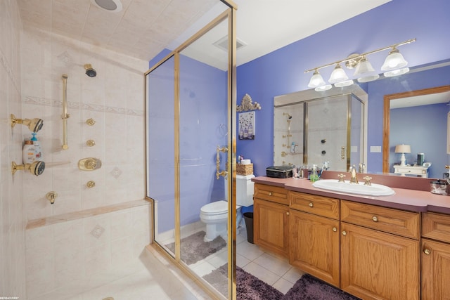 55733 Whitney Ct, Shelby Twp, MI 48315 - bathroom with a shower stall, vanity, and tile patterned flooring