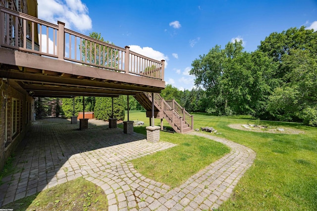 55733 Whitney Ct, Shelby Twp, MI 48315 - view of grassy yard featuring a patio area, a wooden deck, and stairs