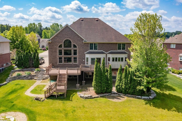 55733 Whitney Ct, Shelby Twp, MI 48315 - rear view of house featuring a deck, stairs, a lawn, and brick siding