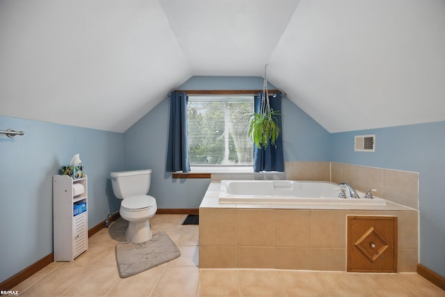 724 Columbia St, Algonac, MI 48001 - full bathroom with toilet, a bath, vaulted ceiling, tile patterned flooring, and baseboards