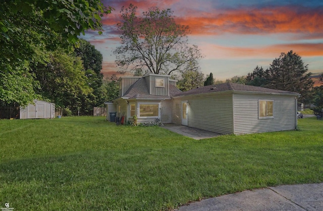 432 Eagle Pass St, Lapeer, MI 48446 - view of front of home featuring a yard and a patio area