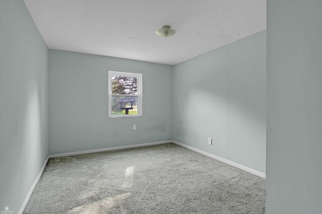 432 Eagle Pass St, Lapeer, MI 48446 - unfurnished room featuring carpet floors and baseboards