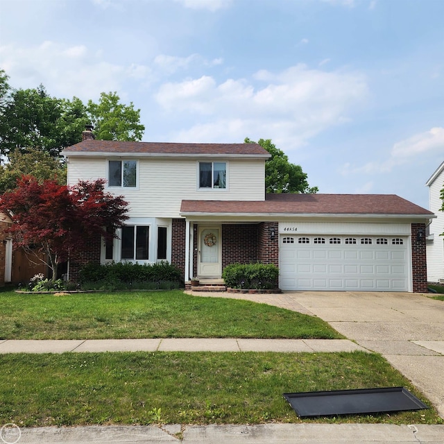44854 Forest Trail Dr, Canton, MI 48187 - traditional-style house featuring a garage, driveway, a front lawn, a chimney, and brick siding