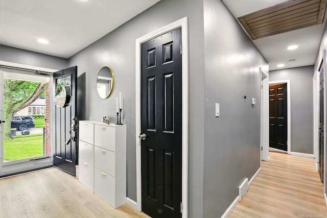 21629 Yale St, Saint Clair Shores, MI 48081 - corridor featuring light wood finished floors, baseboards, and recessed lighting