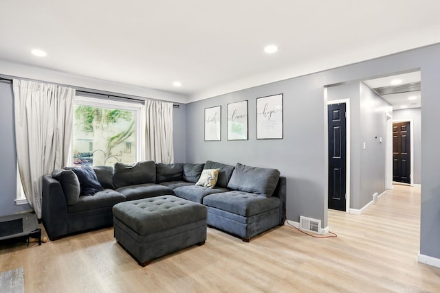 21629 Yale St, Saint Clair Shores, MI 48081 - living room with light wood-style floors, recessed lighting, and baseboards