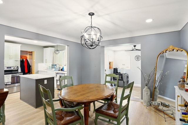 21629 Yale St, Saint Clair Shores, MI 48081 - dining room featuring light wood-style flooring, recessed lighting, baseboards, and a chandelier