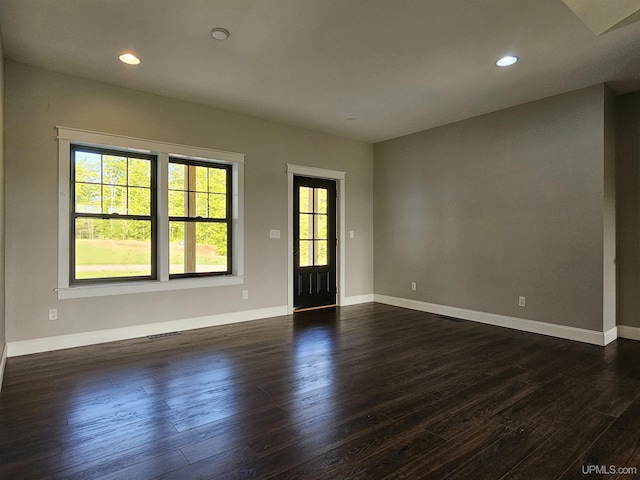 48050 Harma Rd, Atlantic Mine, MI 49905 - spare room with dark wood finished floors, baseboards, and recessed lighting