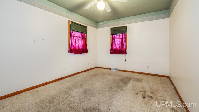 8102 W.5 Rd, Rapid River, MI 49878 - carpeted empty room with ceiling fan and baseboards