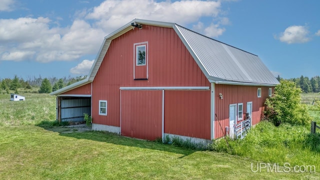 8102 W.5 Rd, Rapid River, MI 49878 - view of barn featuring a yard