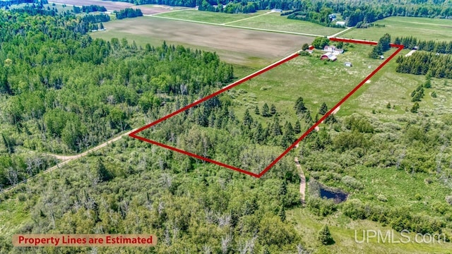 8102 W.5 Rd, Rapid River, MI 49878 - view of rural area with property parcel outlined and a heavily wooded area