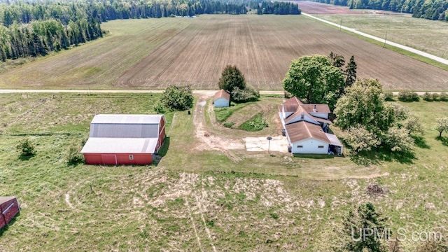 8102 W.5 Rd, Rapid River, MI 49878 - overview of rural landscape with rows of crops