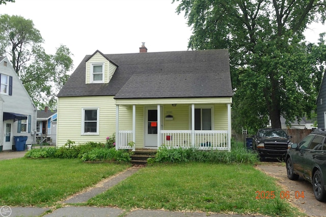 1321 Cornell Rd, Muskegon, MI 49441 - cape cod-style house with covered porch, a front lawn, a chimney, and roof with shingles