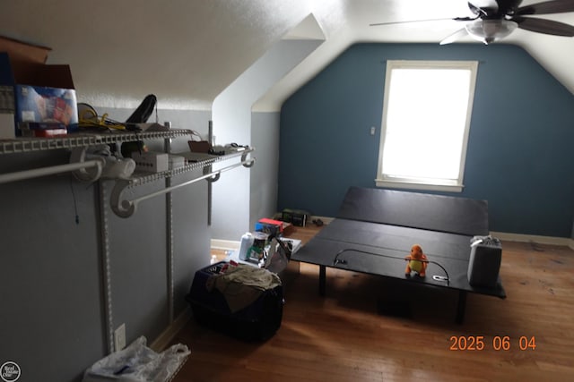 1321 Cornell Rd, Muskegon, MI 49441 - additional living space with a ceiling fan, vaulted ceiling, wood finished floors, and baseboards