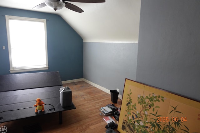 1321 Cornell Rd, Muskegon, MI 49441 - additional living space featuring a ceiling fan, vaulted ceiling, wood finished floors, and baseboards