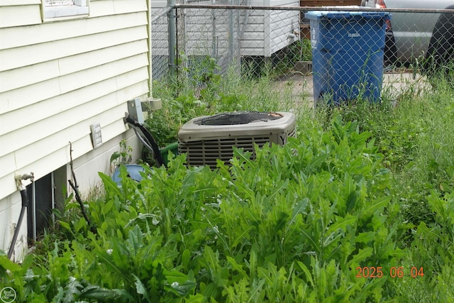 1321 Cornell Rd, Muskegon, MI 49441 - exterior view of central AC unit