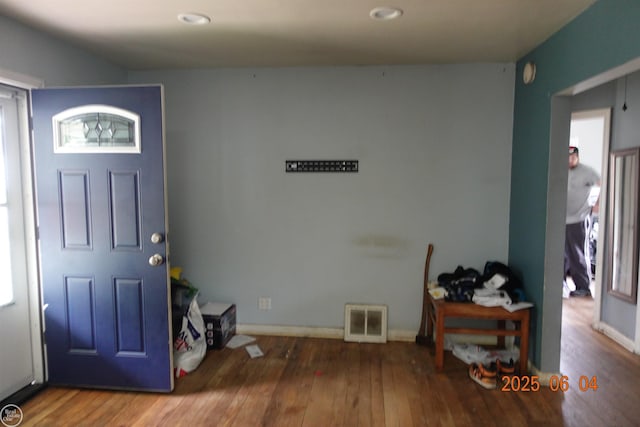 1321 Cornell Rd, Muskegon, MI 49441 - foyer entrance with hardwood / wood-style floors, baseboards, and recessed lighting