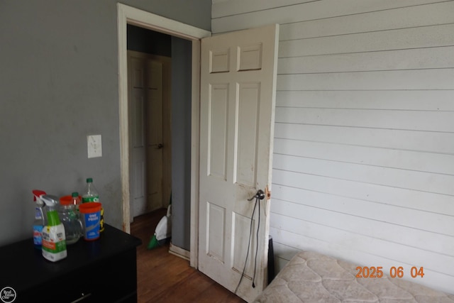 1321 Cornell Rd, Muskegon, MI 49441 - bedroom featuring dark wood-type flooring