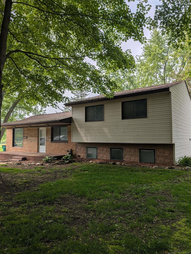60606 Avendt Dr, New Haven, MI 48048 - view of front of property featuring a front lawn and brick siding
