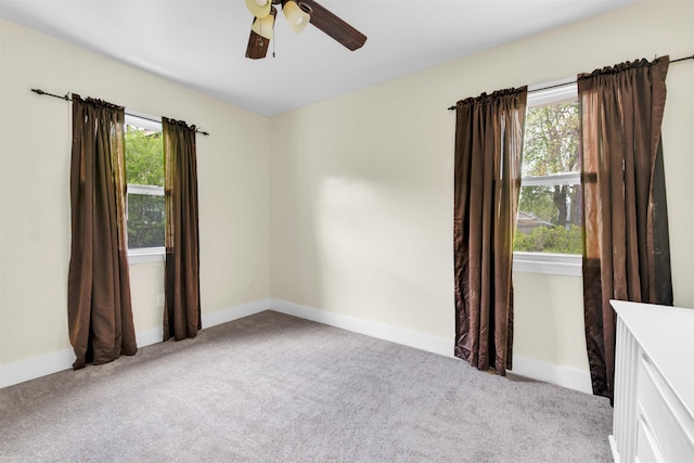 28316 Little Mack Ave, Saint Clair Shores, MI 48081 - unfurnished room with carpet, healthy amount of natural light, a ceiling fan, and baseboards