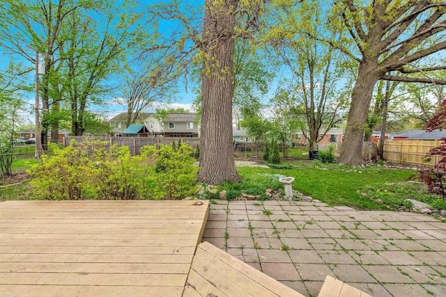 28316 Little Mack Ave, Saint Clair Shores, MI 48081 - wooden terrace featuring a fenced backyard, a patio, and a residential view