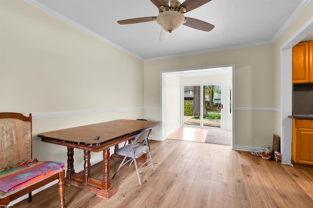 28316 Little Mack Ave, Saint Clair Shores, MI 48081 - dining room featuring light wood-type flooring, crown molding, baseboards, and a ceiling fan