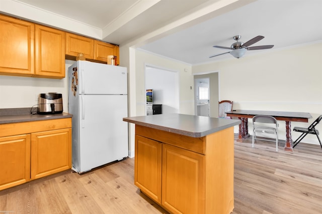28316 Little Mack Ave, Saint Clair Shores, MI 48081 - kitchen featuring freestanding refrigerator, crown molding, dark countertops, light wood finished floors, and ceiling fan