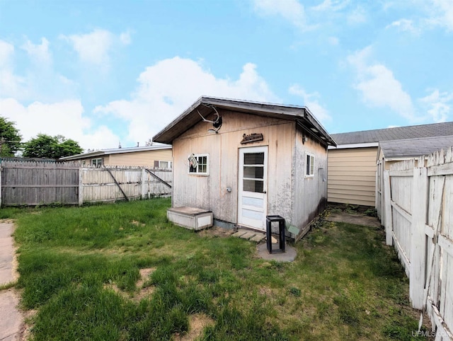 104 Provider St, Gwinn, MI 49841 - rear view of property with an outbuilding