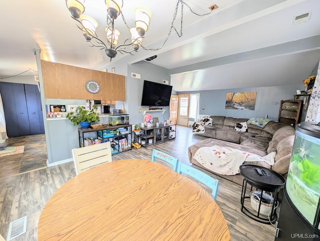 104 Provider St, Gwinn, MI 49841 - living room with a chandelier and wood finished floors