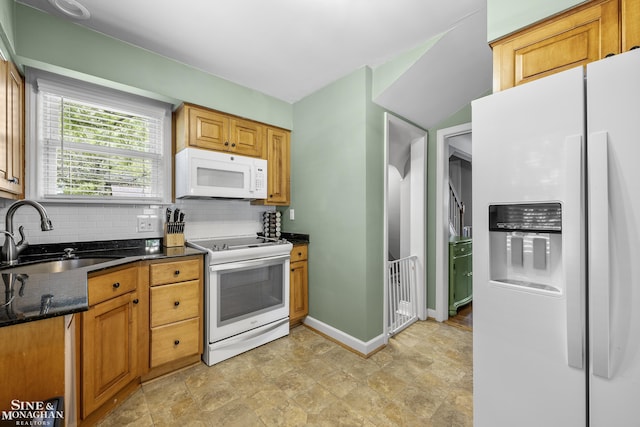 1984 Lancaster St, Grosse Pointe Woods, MI 48236 - kitchen featuring white appliances, a sink, backsplash, baseboards, and stone finish floors