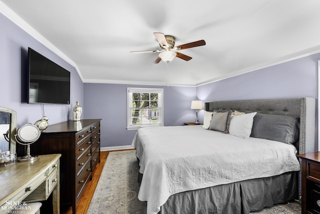 1984 Lancaster St, Grosse Pointe Woods, MI 48236 - bedroom featuring wood finished floors, ornamental molding, a ceiling fan, and baseboards