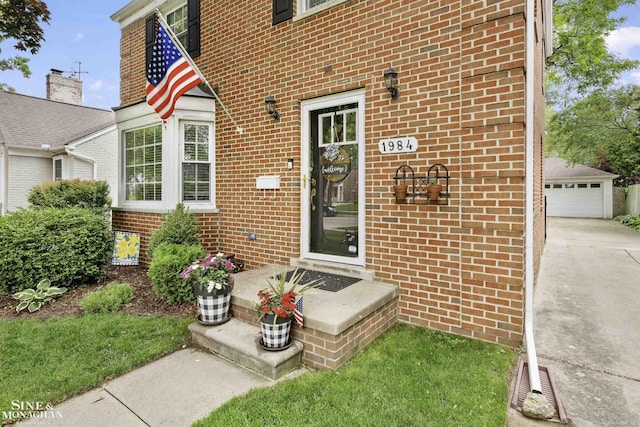 1984 Lancaster St, Grosse Pointe Woods, MI 48236 - doorway to property featuring brick siding