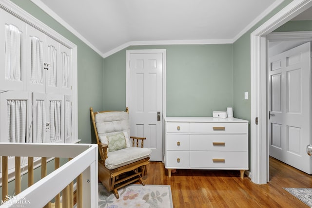 1984 Lancaster St, Grosse Pointe Woods, MI 48236 - bedroom featuring wood finished floors, ornamental molding, and lofted ceiling