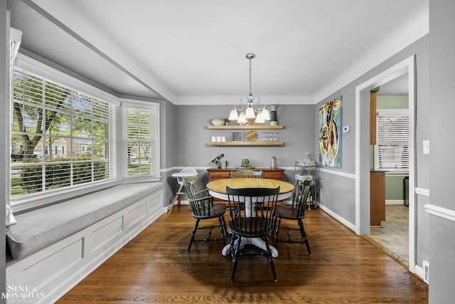 1984 Lancaster St, Grosse Pointe Woods, MI 48236 - dining area featuring a chandelier, healthy amount of natural light, and dark wood finished floors