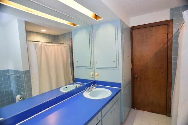 5400 Siebert St, Midland, MI 48640 - full bathroom with vanity, tile patterned floors, and curtained shower