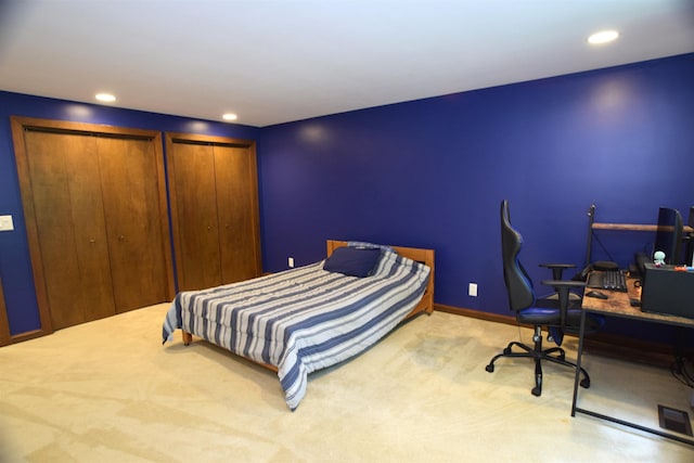 5400 Siebert St, Midland, MI 48640 - bedroom with carpet flooring, multiple closets, recessed lighting, a desk, and baseboards